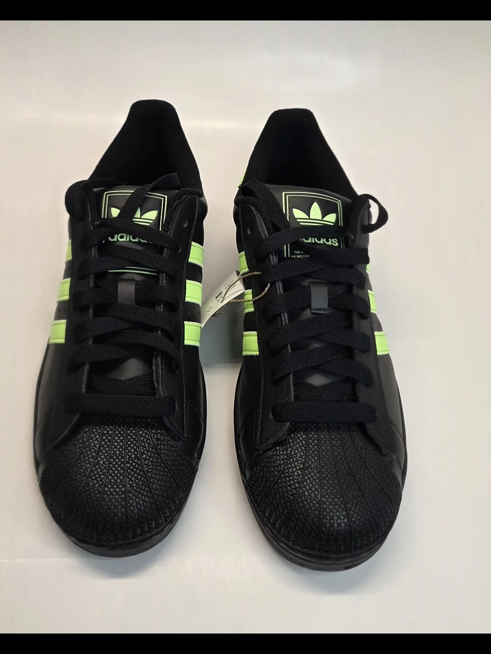 adidas Men’s Black Sneakers with Neon Green Stripes